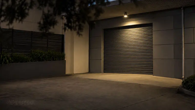 Low-light CCTV camera output showing a clearly lit Sydney commercial loading bay at night, with crisp detail and natural colour.